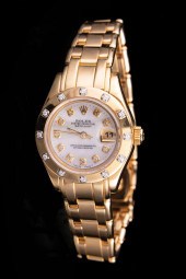 GOLD AND DIAMOND ROLEX LADY'S