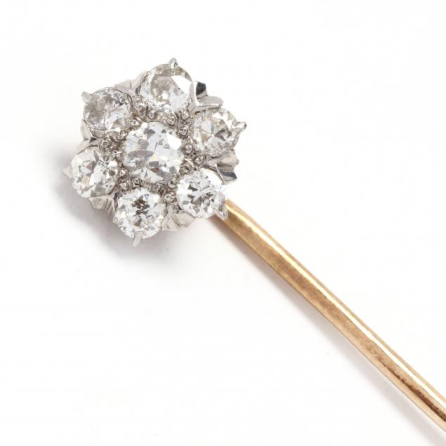 GOLD AND DIAMOND STICK PIN In a