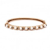 GOLD AND GEM-SET BRACELET, JAC