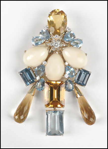 GOLD AND GEM SET BROOCH.