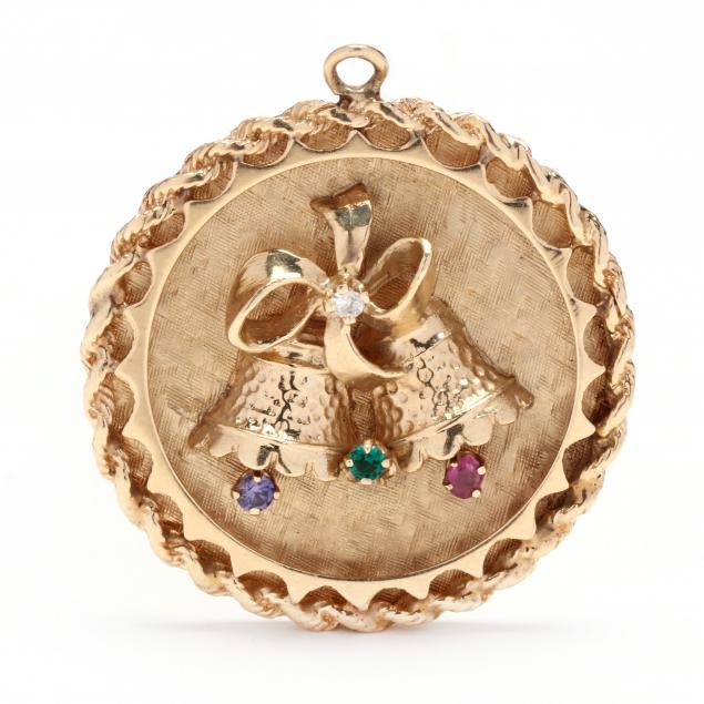 GOLD AND GEM-SET CHARM The round