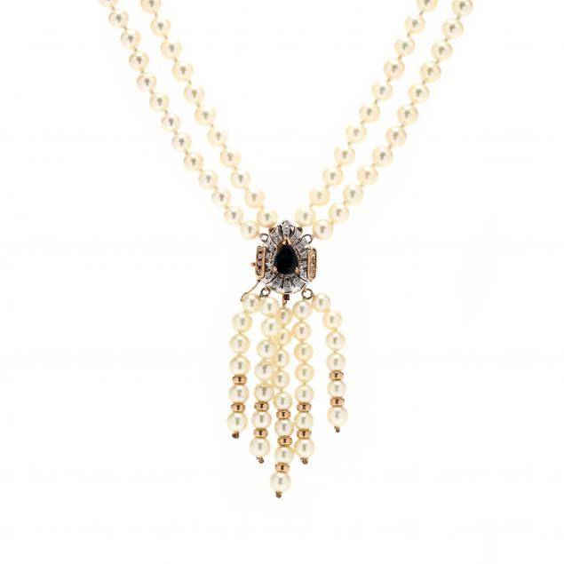 GOLD AND GEM-SET DOUBLE STRAND