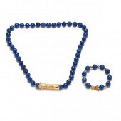 GOLD AND LAPIS LAZULI BEAD NEC