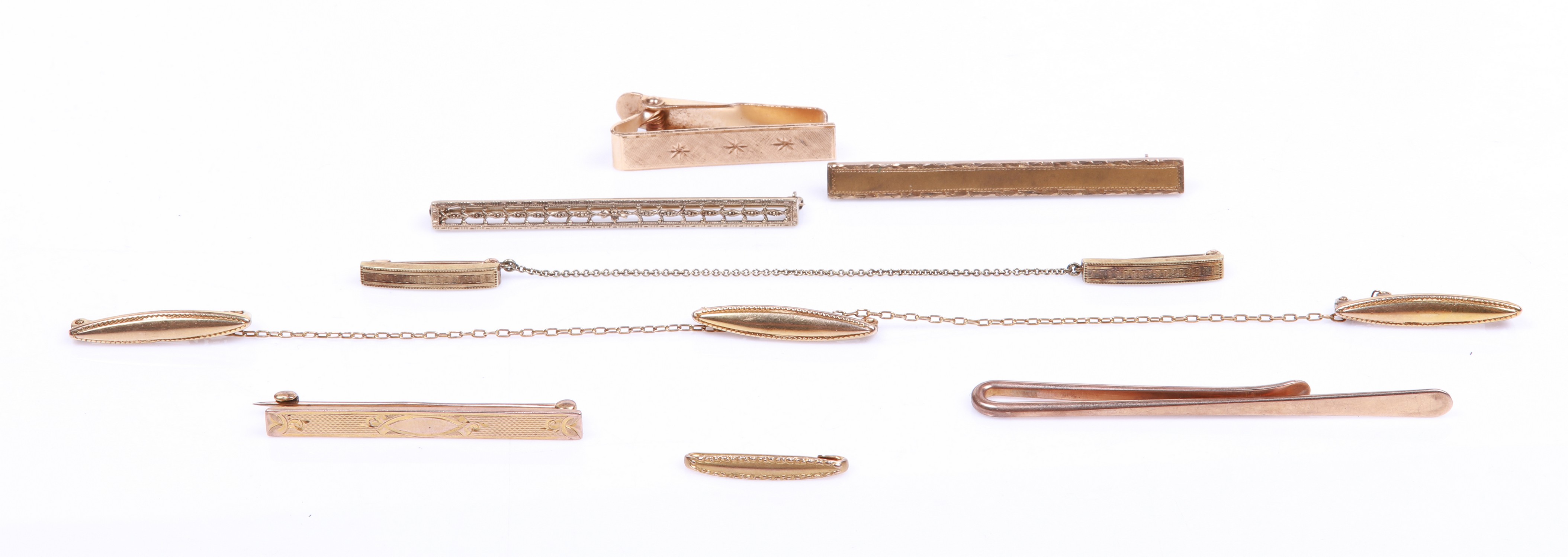 Gold bar pins and tie clips to