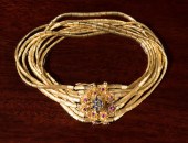 GOLD BRACELET WITH RUBIES AND