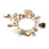 GOLD CHARM BRACELET The gold b