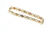 GOLD  DIAMOND AND COLORED STON