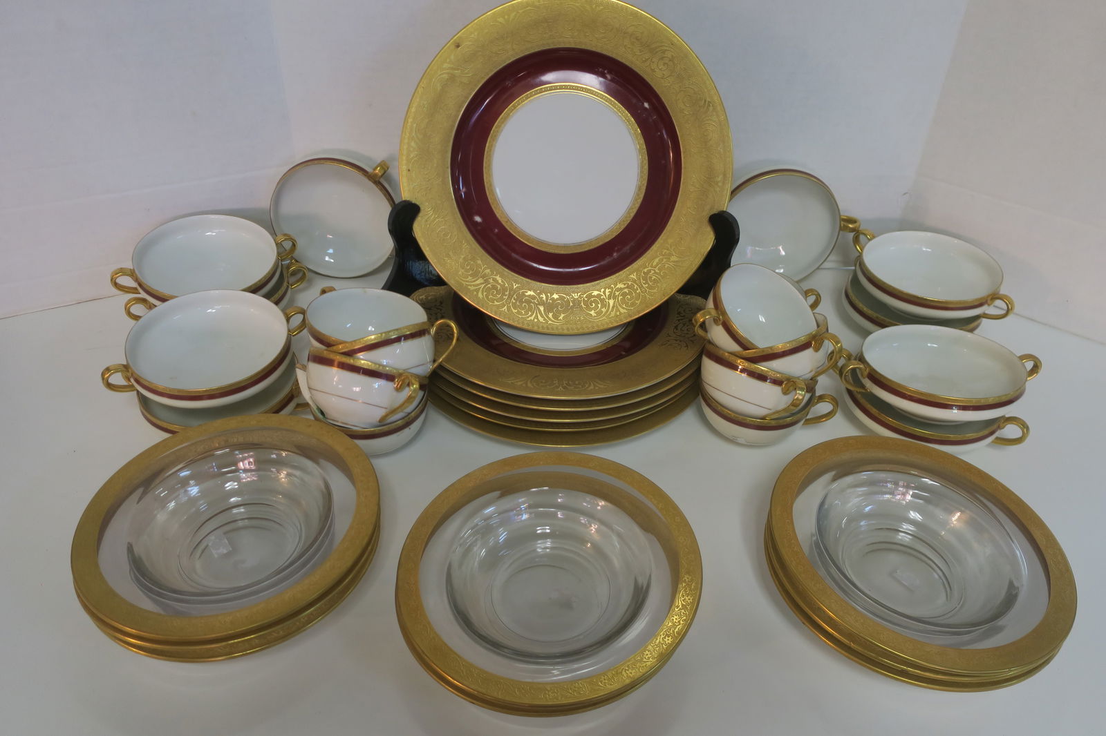 GOLD ENCRUSTED PLATES, CUPS AND