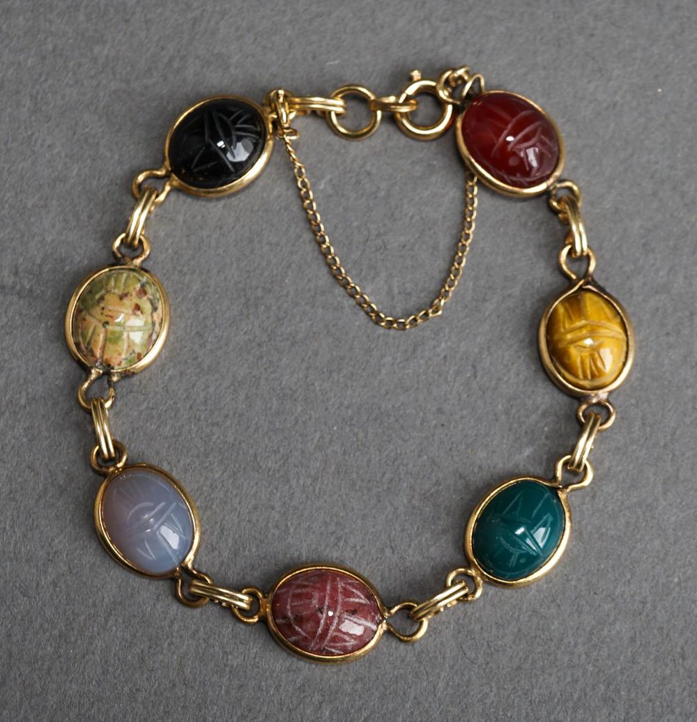 GOLD FILLED AND CARVED STONE
