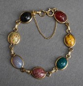 GOLD FILLED AND CARVED STONE '