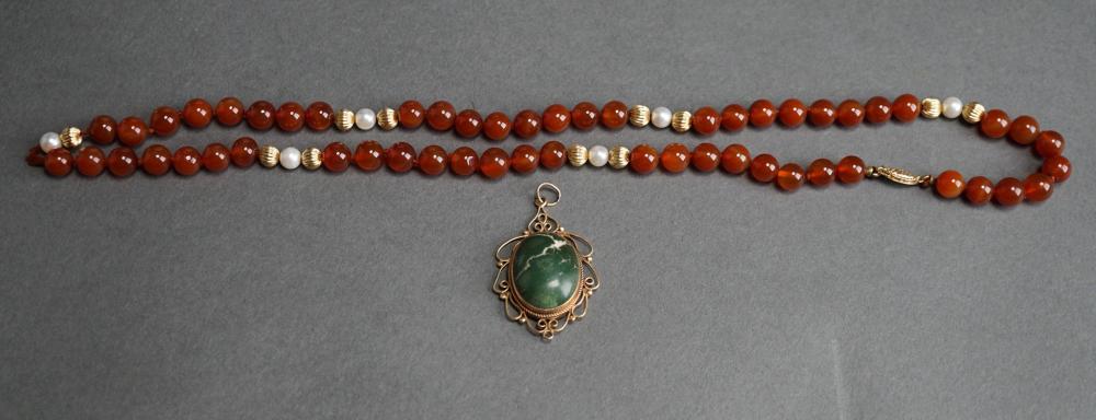 GOLD MOUNTED AND CARNELIAN BEAD