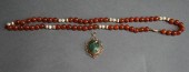 GOLD MOUNTED AND CARNELIAN BEA