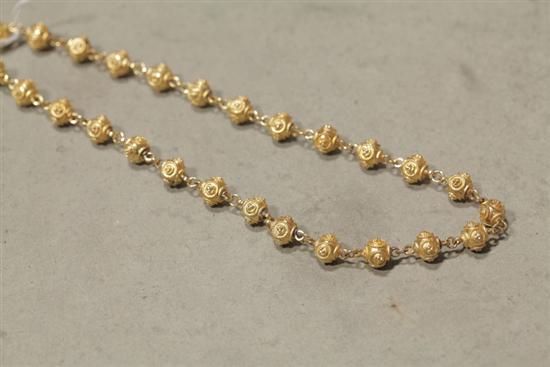 GOLD NECKLACE. Round beads with