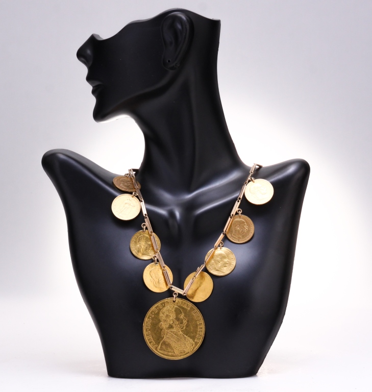GOLD NECKLACE WITH NINE GOLD