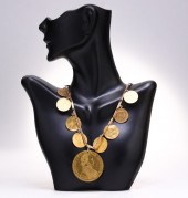 GOLD NECKLACE WITH NINE GOLD A