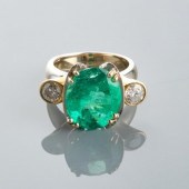 GOLD RING WITH LARGE EMERALD &