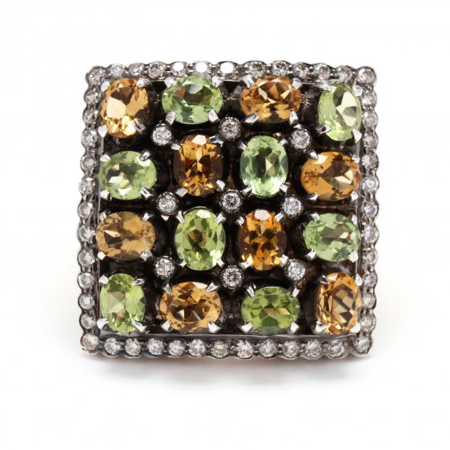 GOLD, SILVER, AND GEM-SET RING