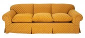 GOLD UPHOLSTERED THREE SEATER