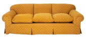 GOLD UPHOLSTERED THREE SEATER