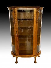 GOLDEN OAK BOWFRONT CURIO DISP