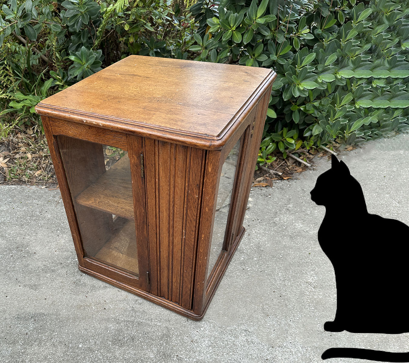GOLDEN OAK ROTATING BOOK CABINET: