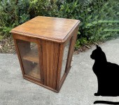 GOLDEN OAK ROTATING BOOK CABIN