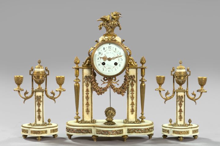 Good Three-Piece Au Vase de Sevres,
