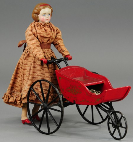 GOODWIN GIRL PUSHING DOLL