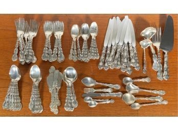 Gorham sterling flatware set, 87