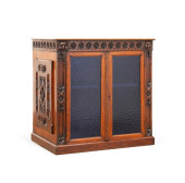 GOTHIC REVIVAL OAK CABINET, MA