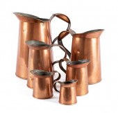 GRADUATING SET OF COPPER MEASU