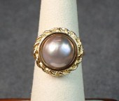 GRAY MABE PEARL AND EIGHTEEN K