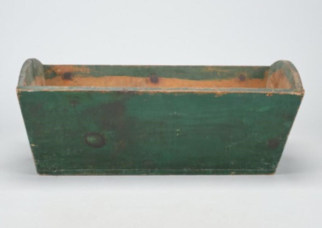 GREEN DOUGH BOXAn open dough box in