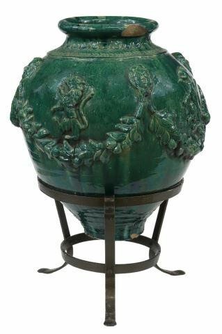GREEN GLAZED EARTHENWARE PLANTER ON