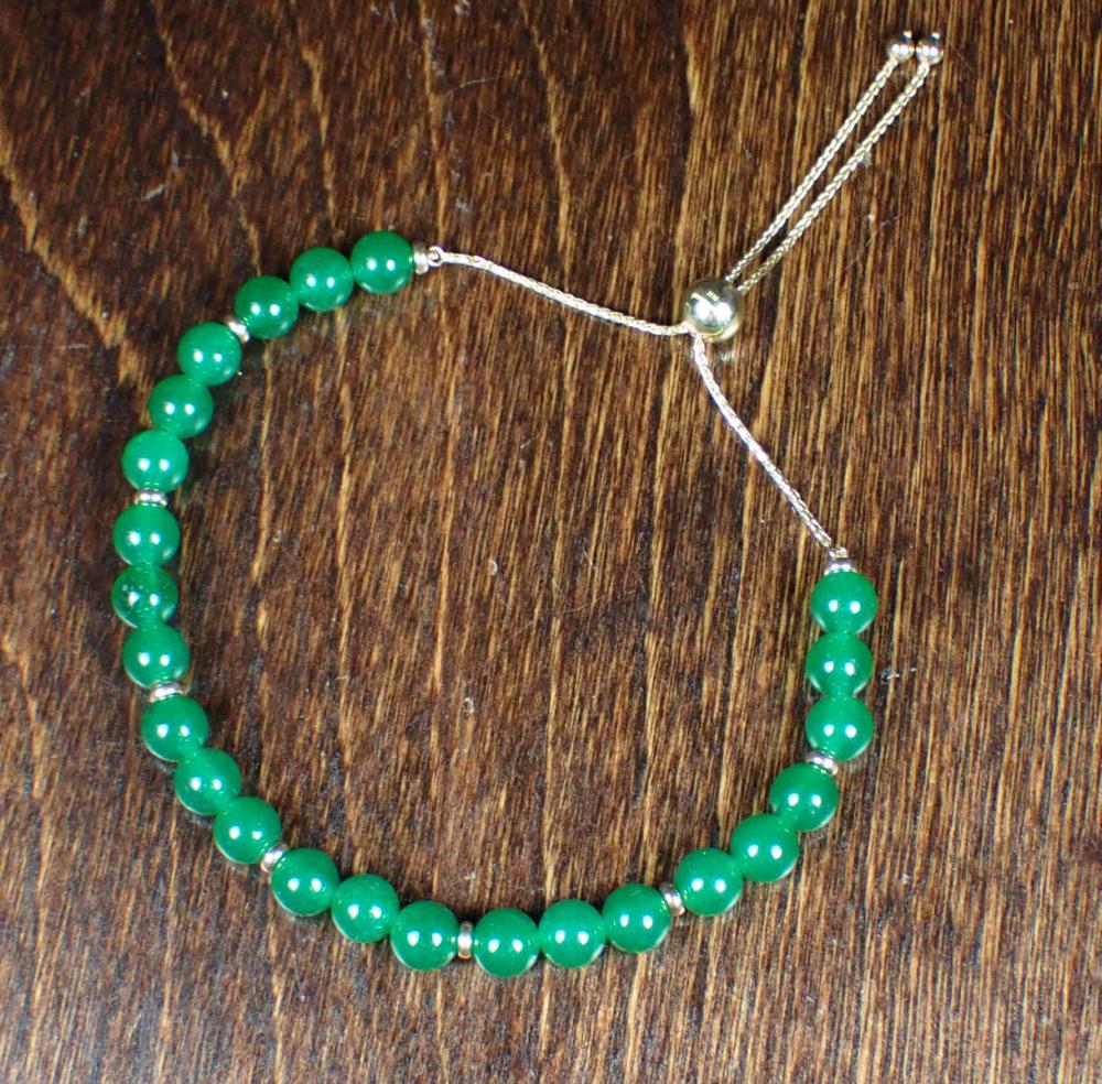 GREEN JADE AND FOURTEEN KARAT