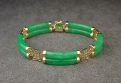 GREEN JADE AND FOURTEEN KARAT