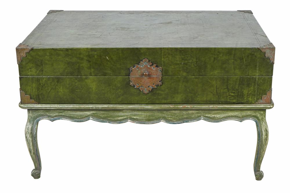 GREEN LEATHER TRUNK ON PAINTED WOOD