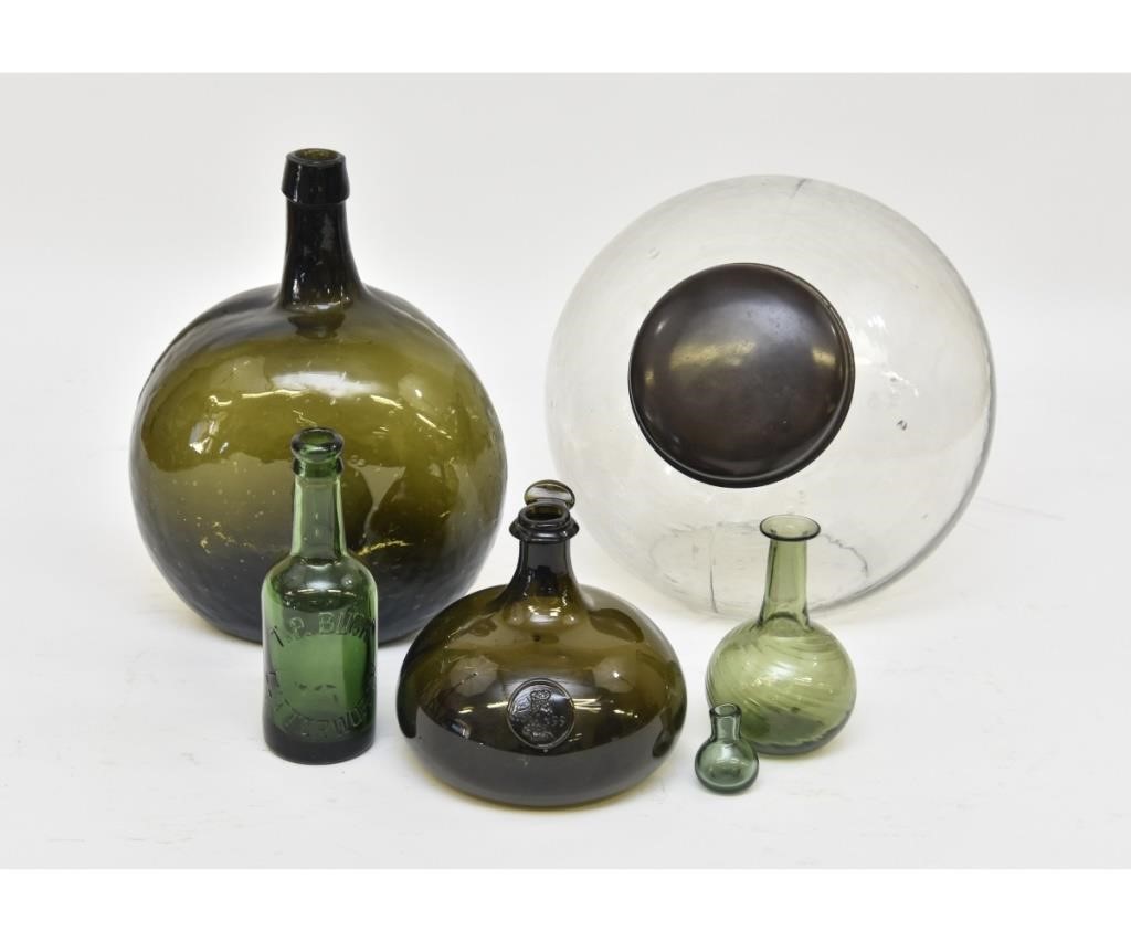 Green molded glass bottle 13"h;