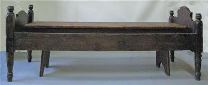 Green-stained folding field bed and