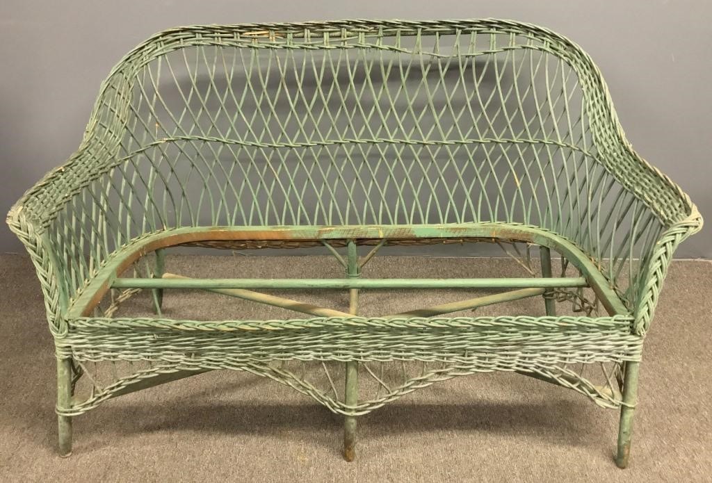 Green wicker settee with Heywood