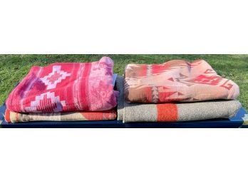 Grey and red/orange wool blanket,