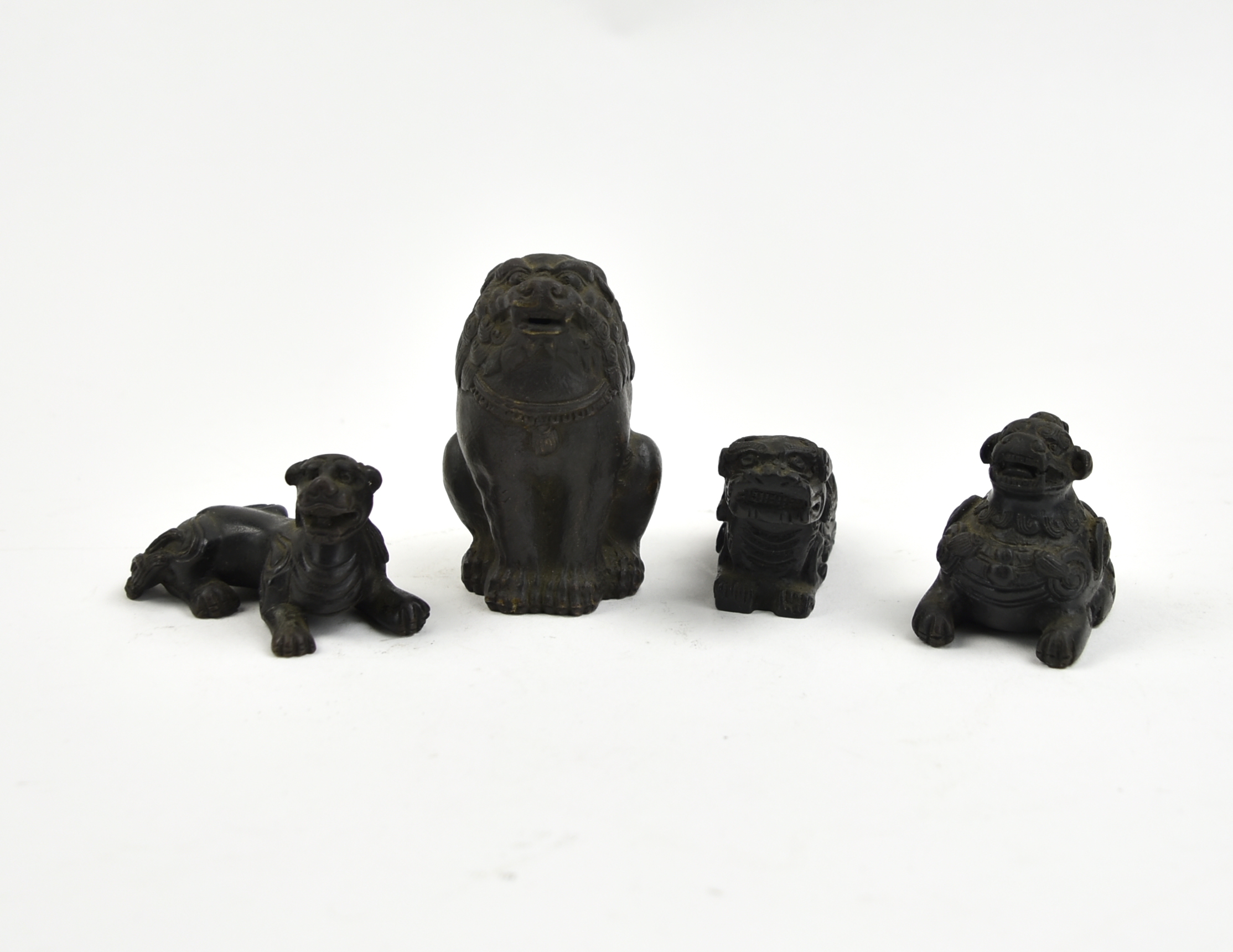 GROUP (4) CHINESE BRONZE FOO-DOG