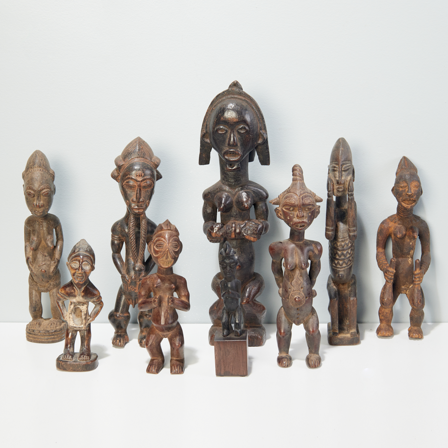 GROUP (9) AFRICAN CARVED WOOD