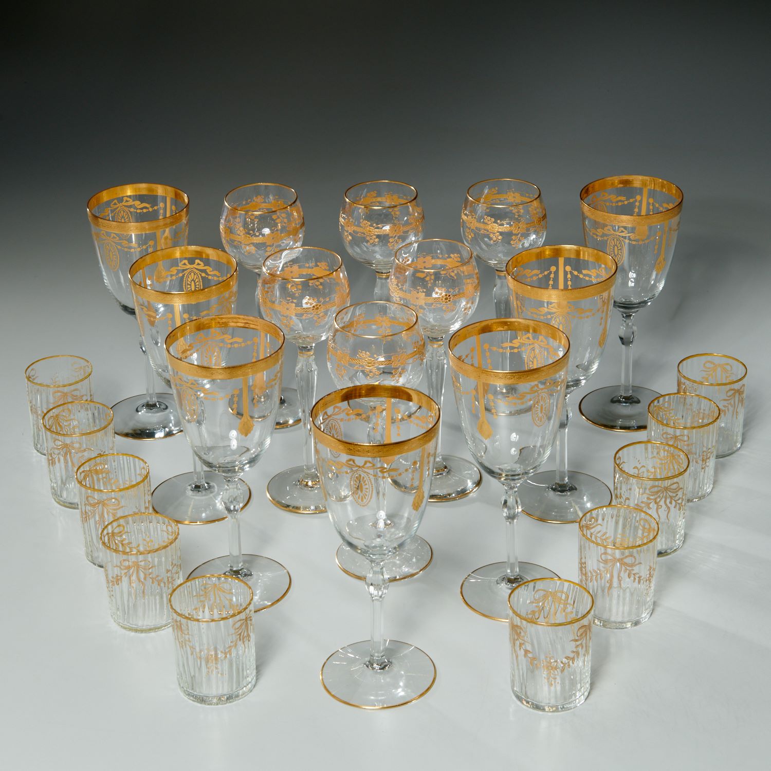 GROUP ELEGANT GILT STEMWARE AND