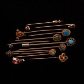 GROUP OF 12 GOLD AND GEMSTONE
