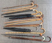 GROUP OF 17 CANES AND UMBRELLA