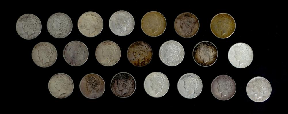 GROUP OF 21 SILVER DOLLAR COINS