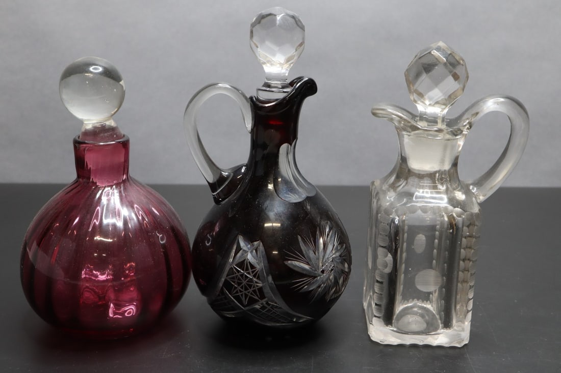 GROUP OF 3 CRUETS, RUBY GLASS CUT