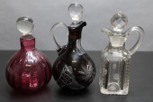 GROUP OF 3 CRUETS, RUBY GLASS