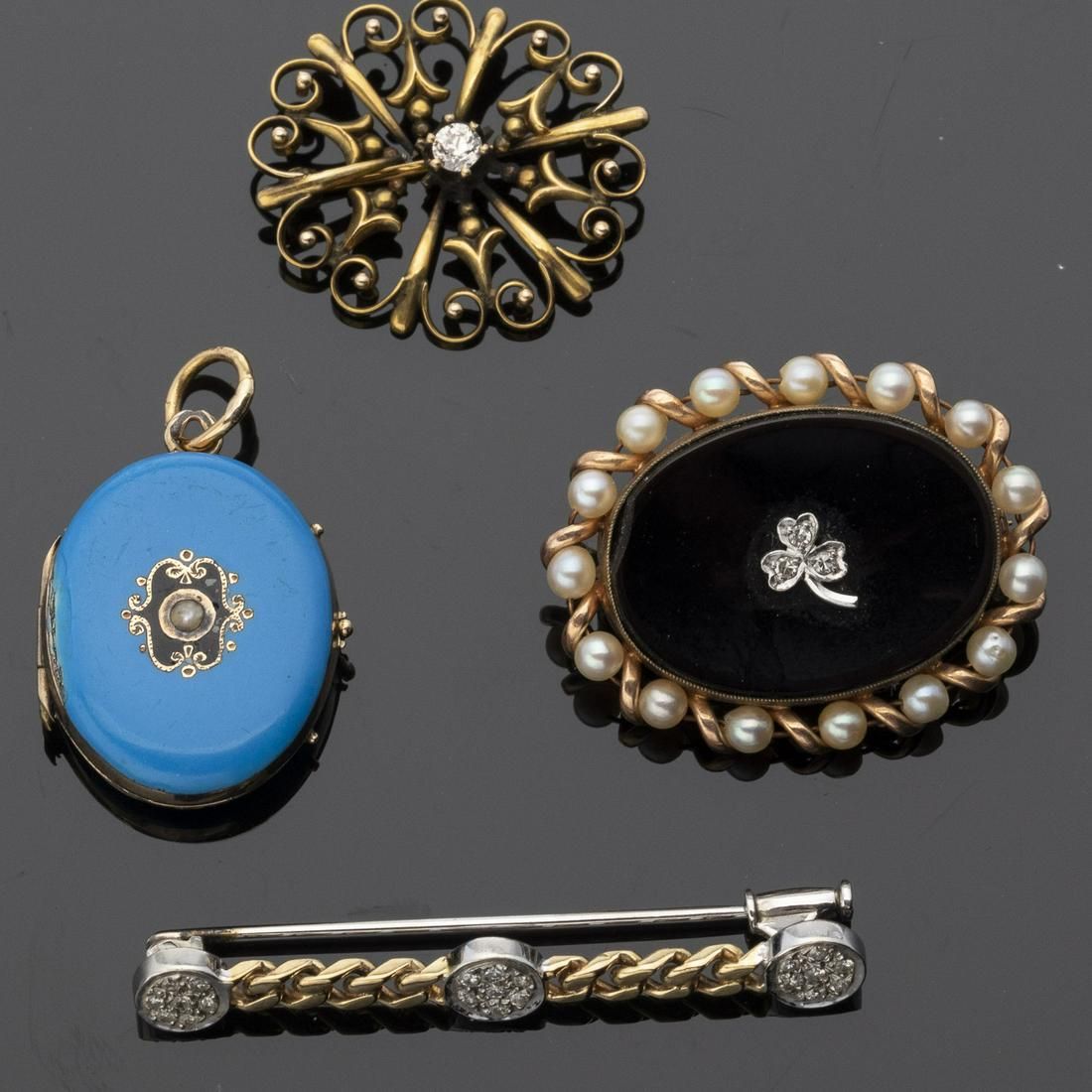 GROUP OF 3 GOLD PINS AND A GOLD AND